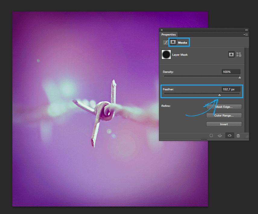 Blurring the circle outline by moving up the Feather slider on the Layer Mask Properties panel.