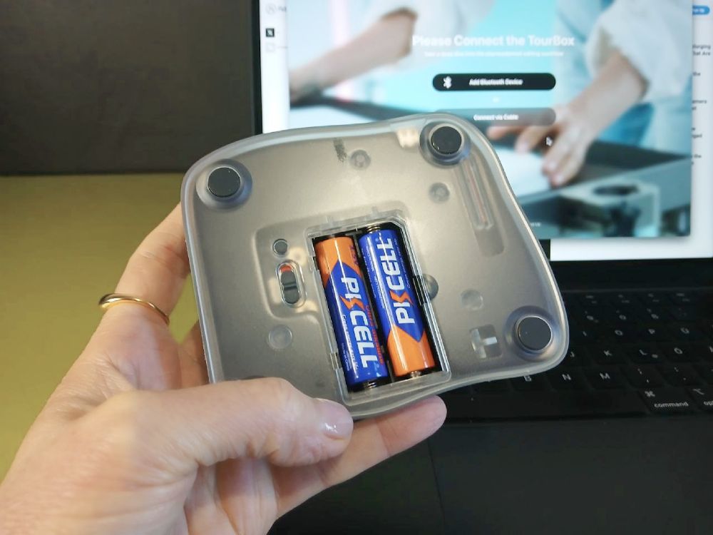 The device runs on two AA batteries that are added on the back.
